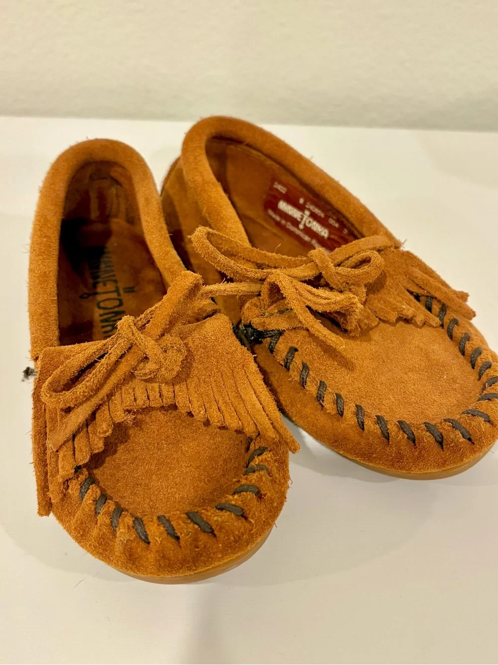 Authentic Minnetonka toddler size 8 Suede Fringe Moccasins - Cognac Brown